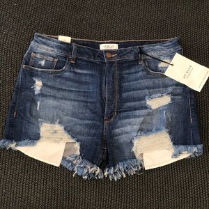 mild hand sanding dark denim jean shorts